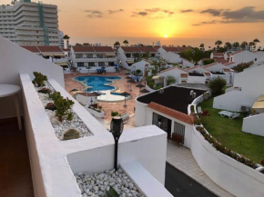 Apartamento Helena en Garden City con piscina climatizada